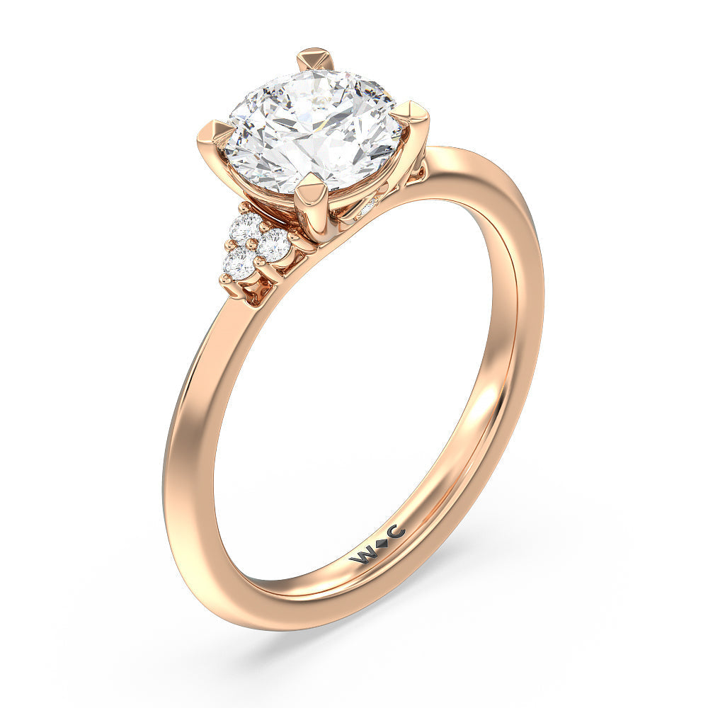 Taper Knife Edge Side Stone Engagement Ring with Round Cut Diamond in 14KT Rose Gold view 3
