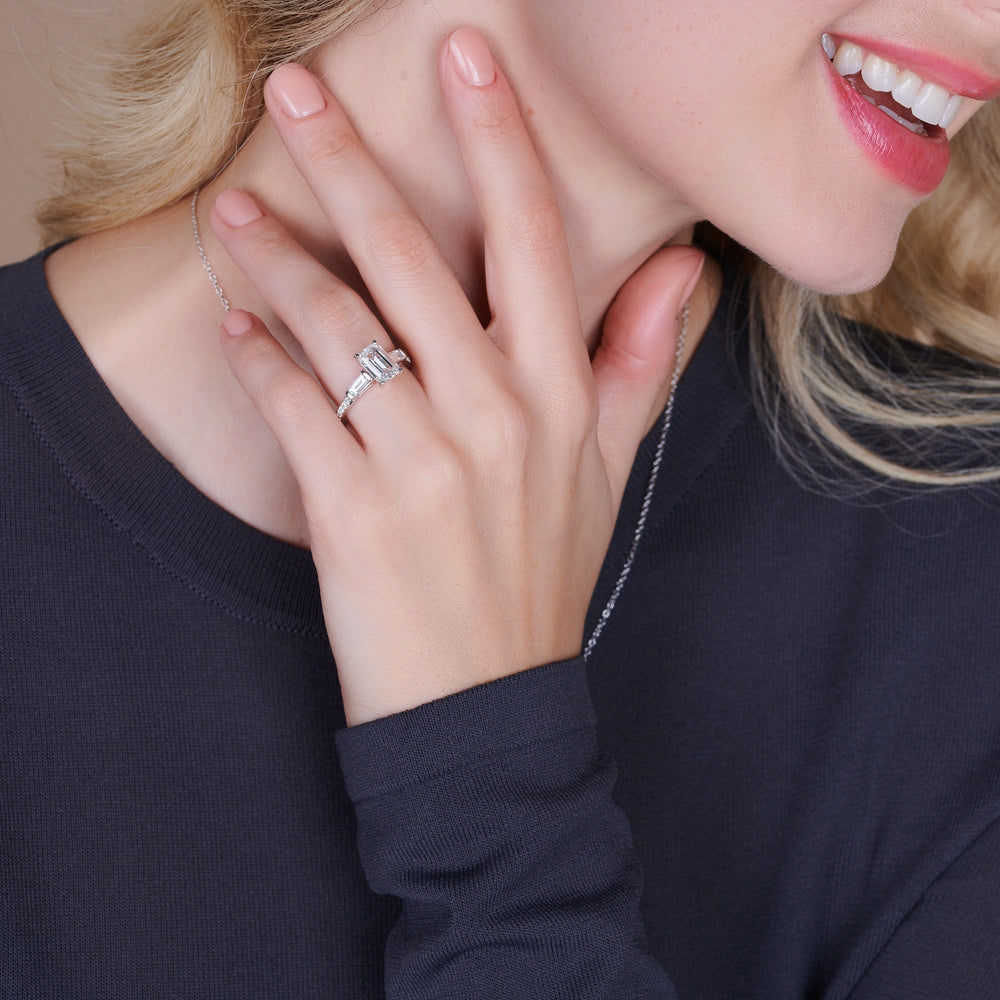 Model Wearing Three Stone Tapered Baguette Diamond Engagement Ring with Lab Grown Diamond view