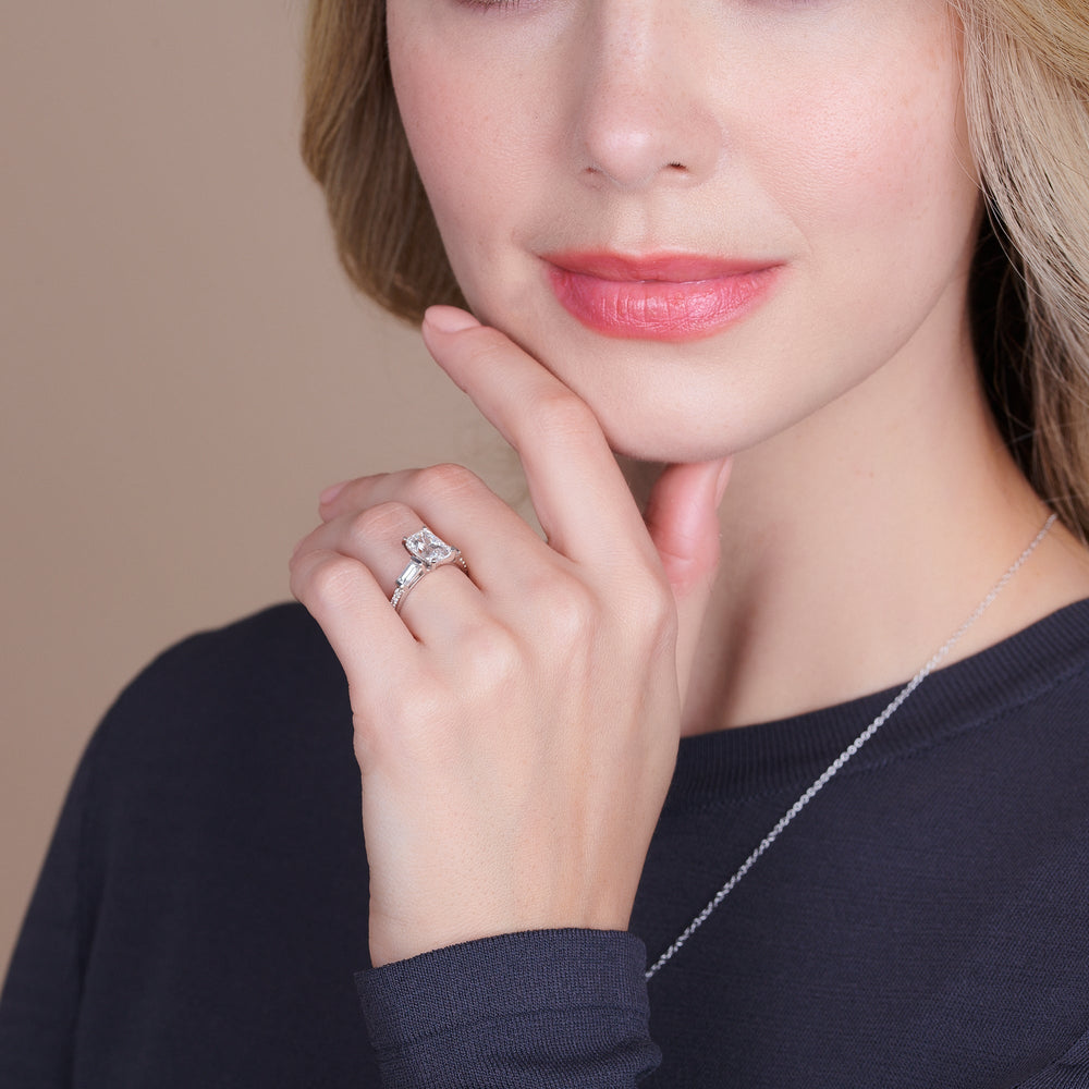 Model Wearing Three Stone Tapered Baguette Diamond Engagement Ring with Lab Grown Diamond view