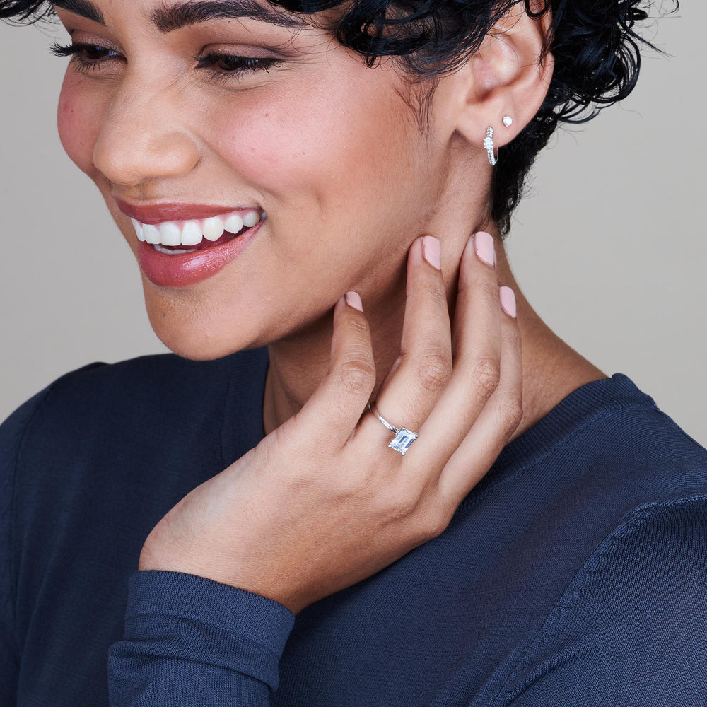 Model Wearing Sleek Cathedral Solitaire Engagement Ring with Lab Grown Diamond view
