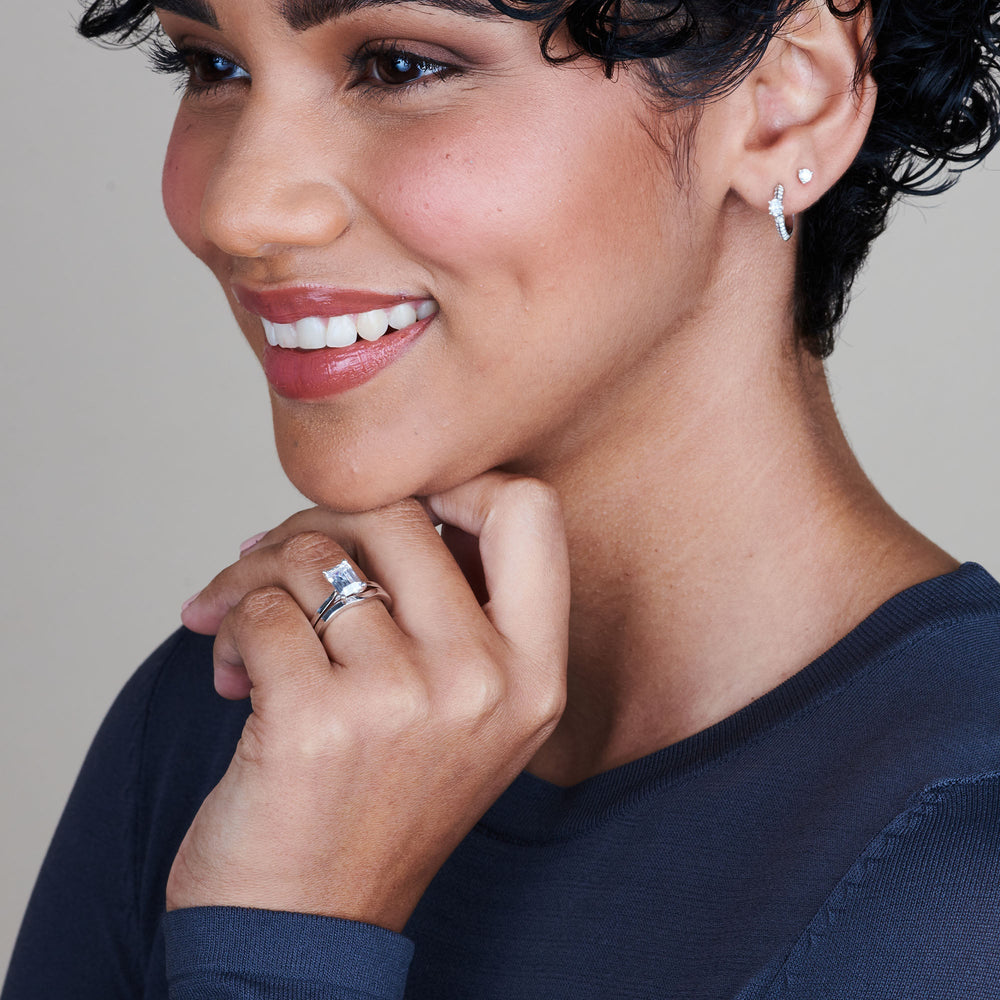 Model Wearing Sleek Cathedral Solitaire Engagement Ring with Lab Grown Diamond view
