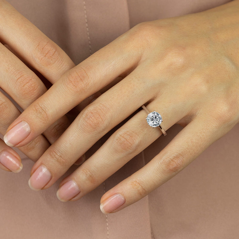 Model Wearing Sleek Cathedral Solitaire Engagement Ring with Lab Grown Diamond view