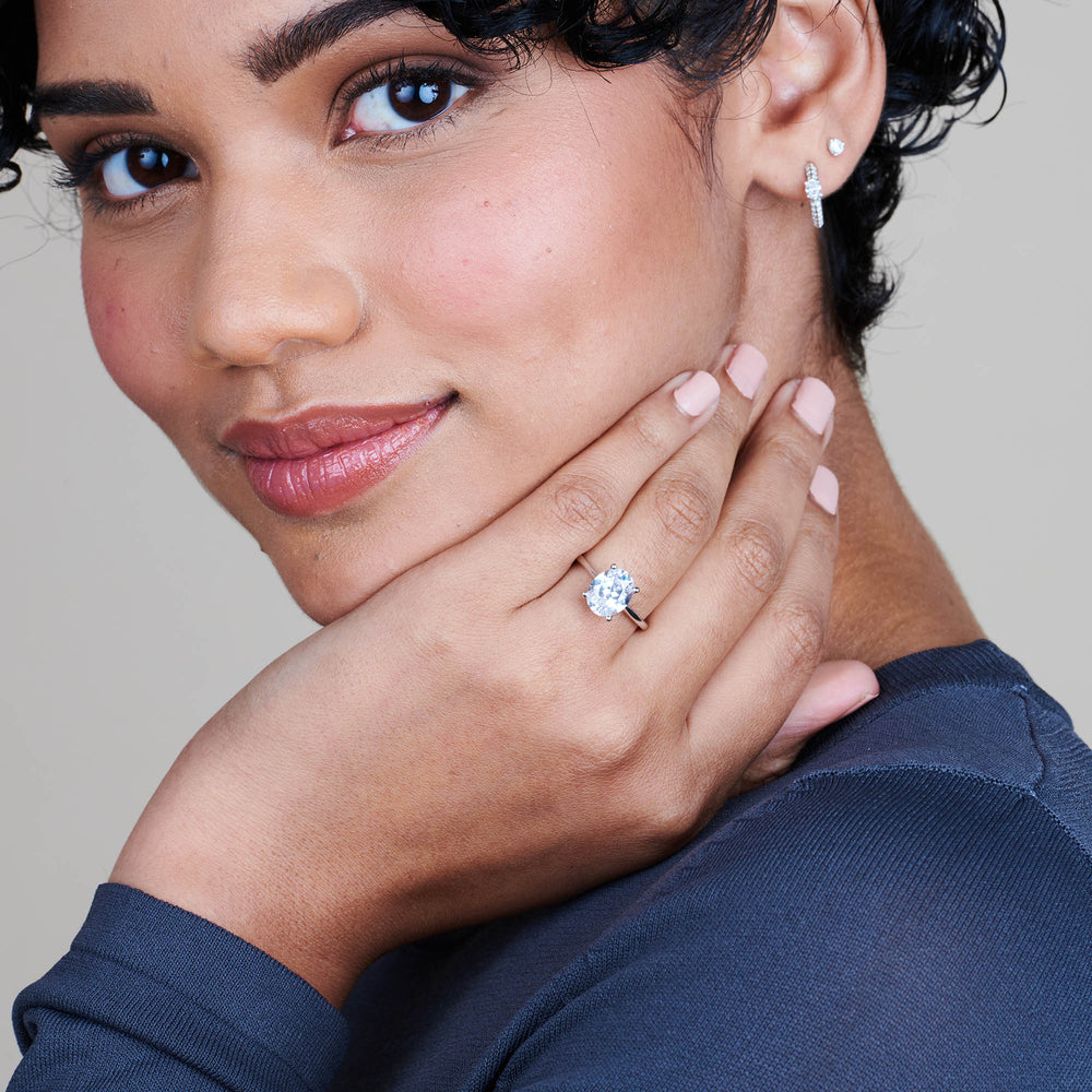 Model Wearing Noveau Four Prong Solitaire Engagement Ring with Lab Grown Diamond view
