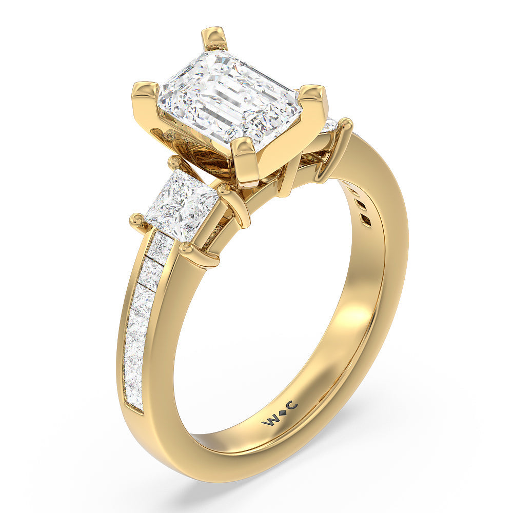 Three Stone Princess Studded Engagement Ring with Emerald Cut Diamond in 14KT Yellow Gold view 3
