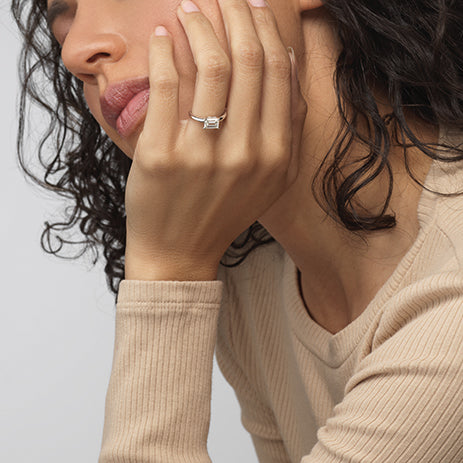 Model Wearing Classic Four Prong East West Engagement Ring with Lab Grown Diamond view