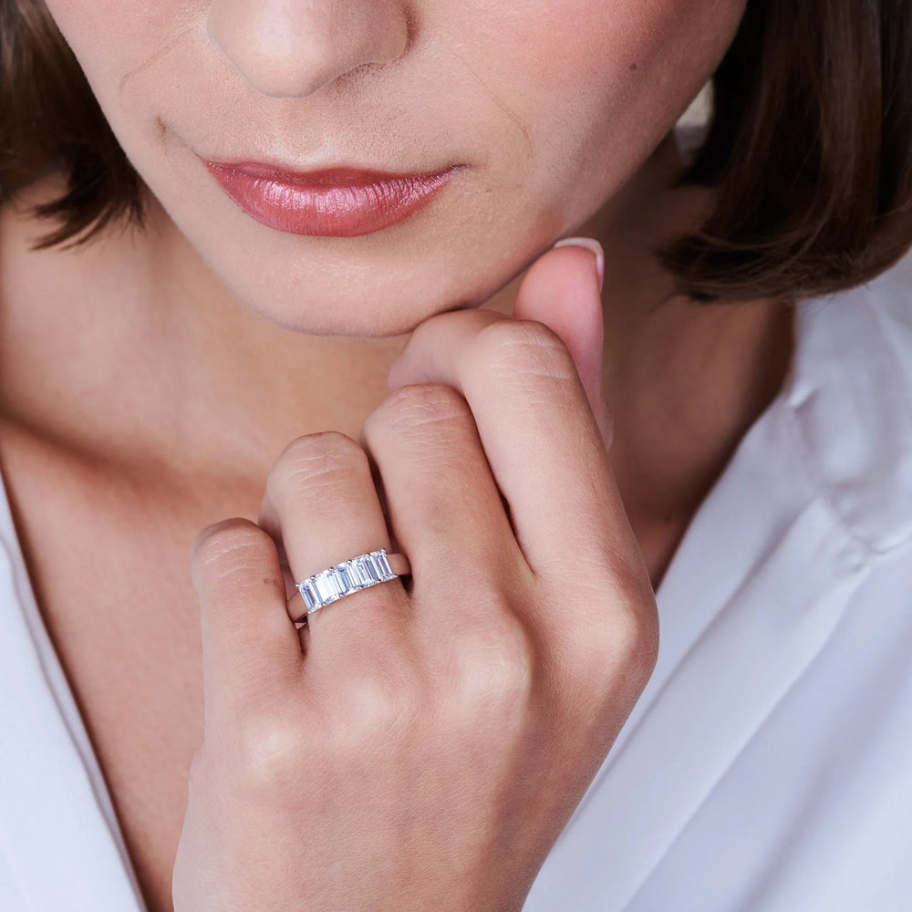 Model Wearing Five Stone Emerald Cut Diamond Ring (E+ VS+) view
