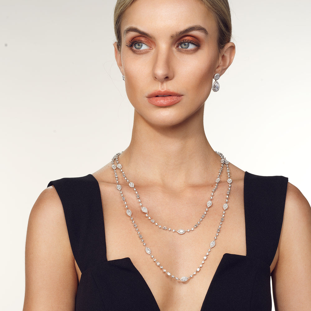 Model Wearing Statement Opera Two Row Multi Shape Halo Diamond Station Necklace view