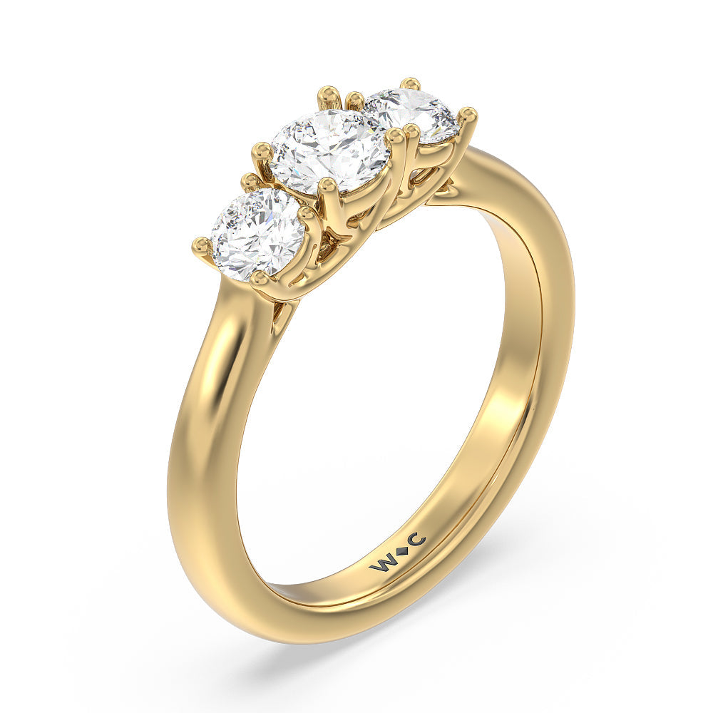 Three Stone Round Brilliant Cut Diamond Ring (F/G SI+) with 18KT Yellow Gold / Natural / 1 Cut Diamond in 14KT Yellow Gold / Natural / 1 view 3
